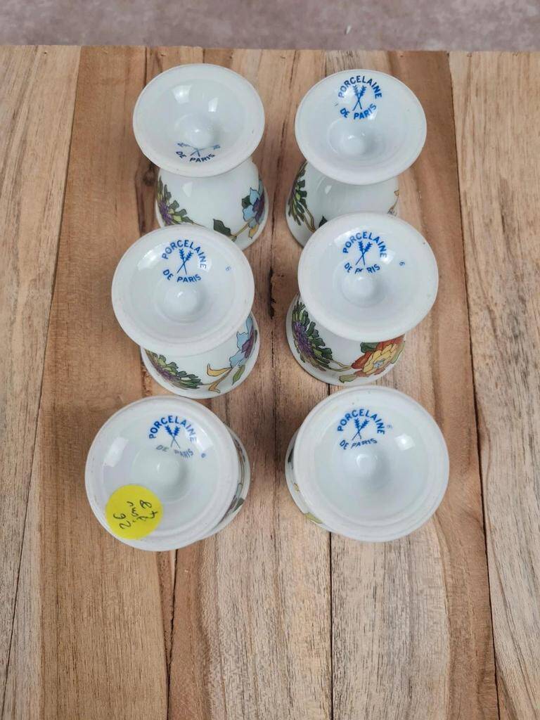 Set of 6 antique egg cups in porcelain from Paris + wooden stand