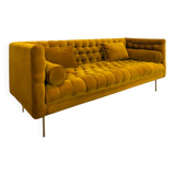 Canapé en velours couleur safran