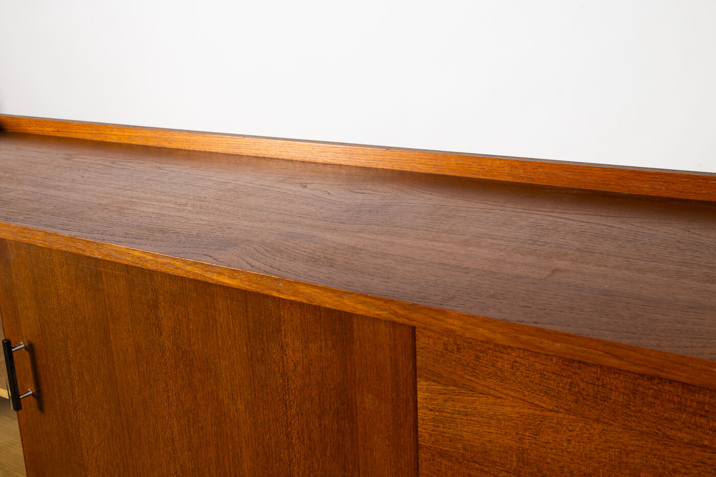 High wooden and glass line of the 60s