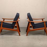 Pair Scandinavian Modern armchairs in teak and dark blue bouclé fabric