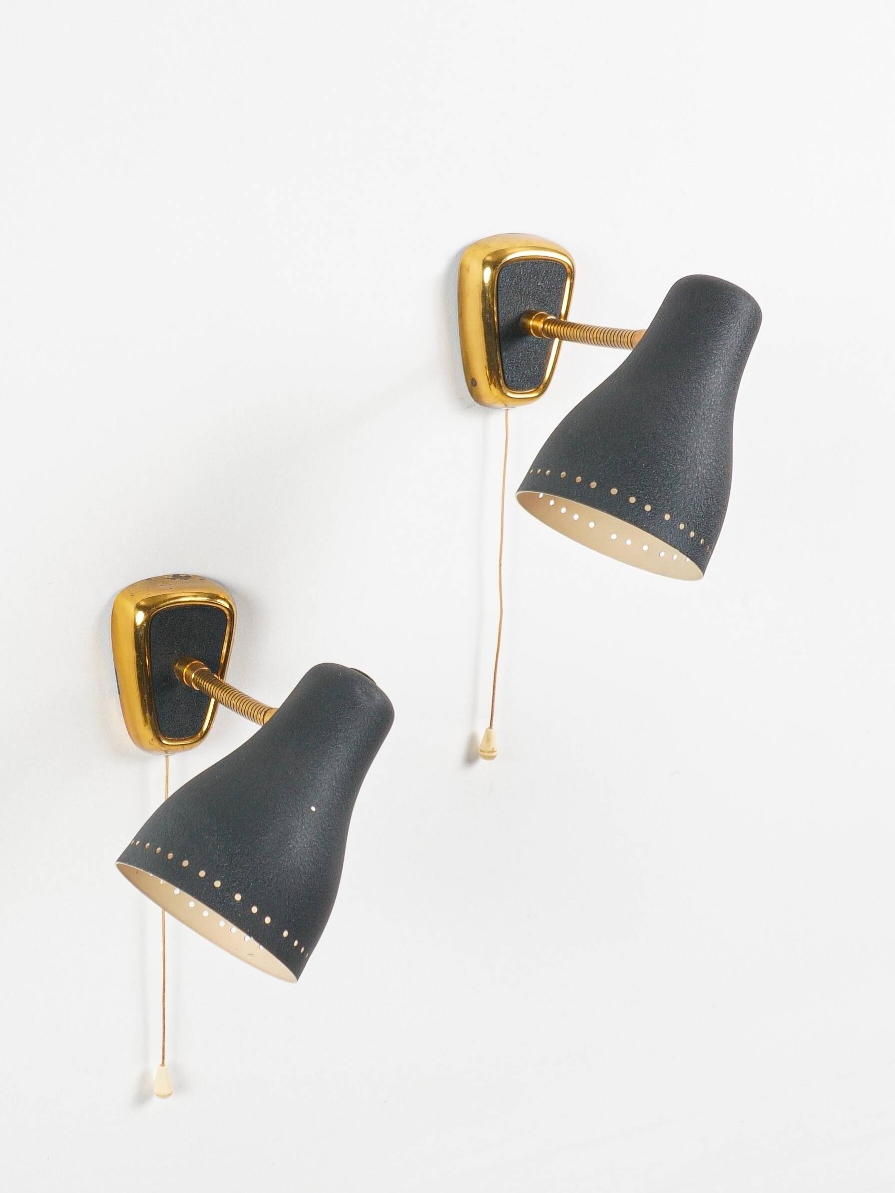 Jacques biny (designer) - pair of adjustable wall lights in brass & metal