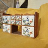 Vintage wooden spice rack with ceramic drawers