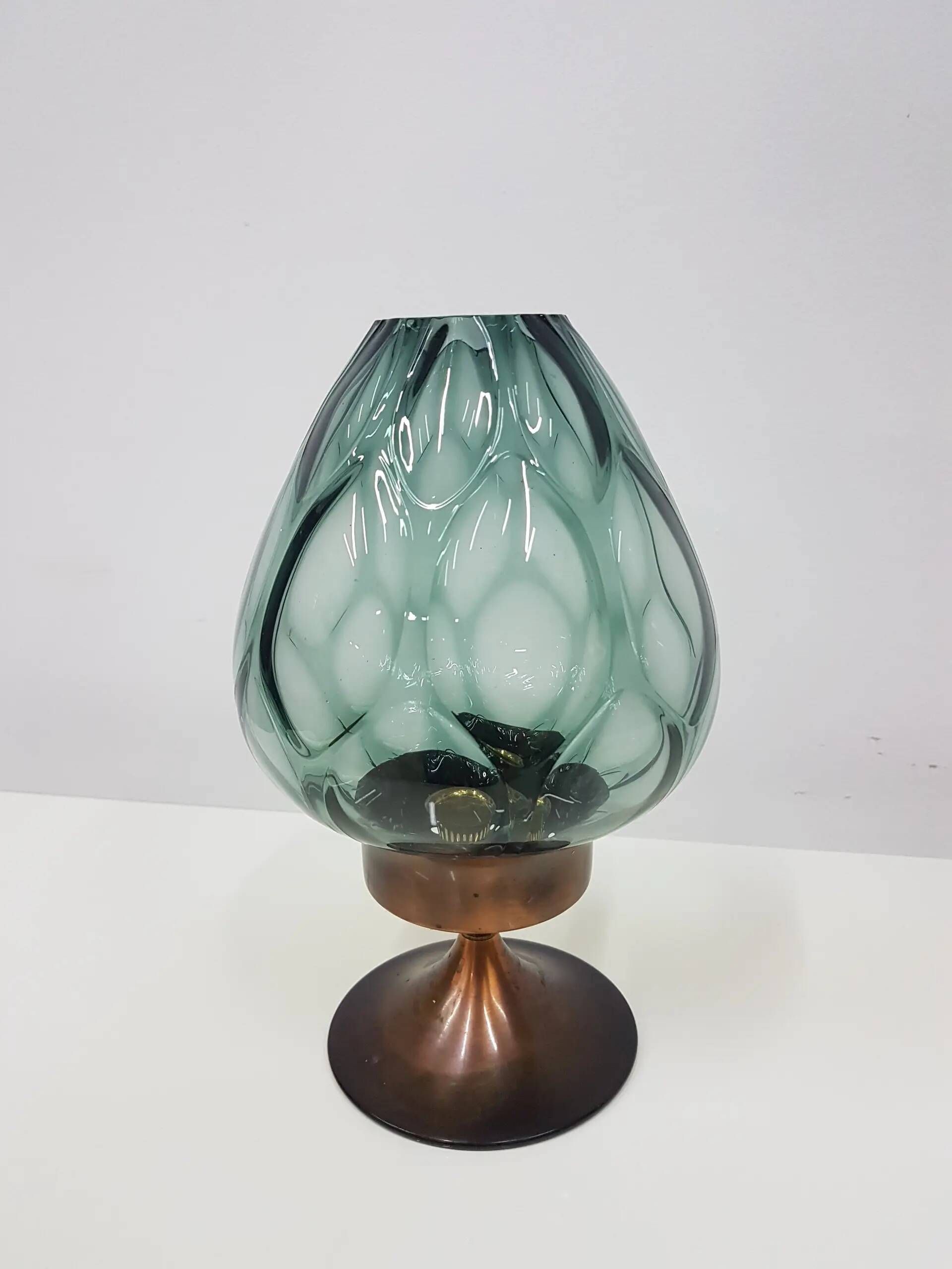 Candlestick, gold-tone brass, clear greenish glass, Austria, 1960s.