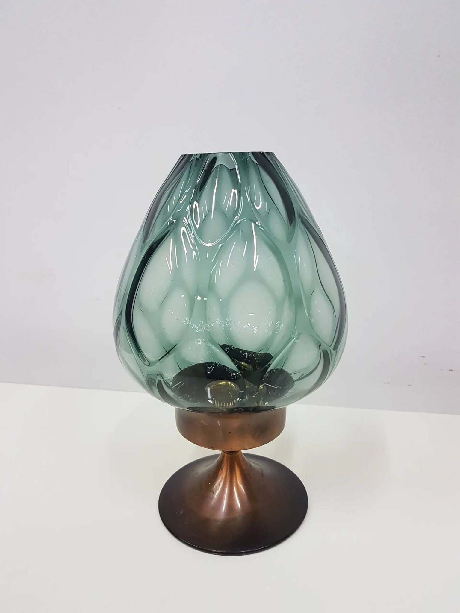Candlestick, gold-tone brass, clear greenish glass, Austria, 1960s.