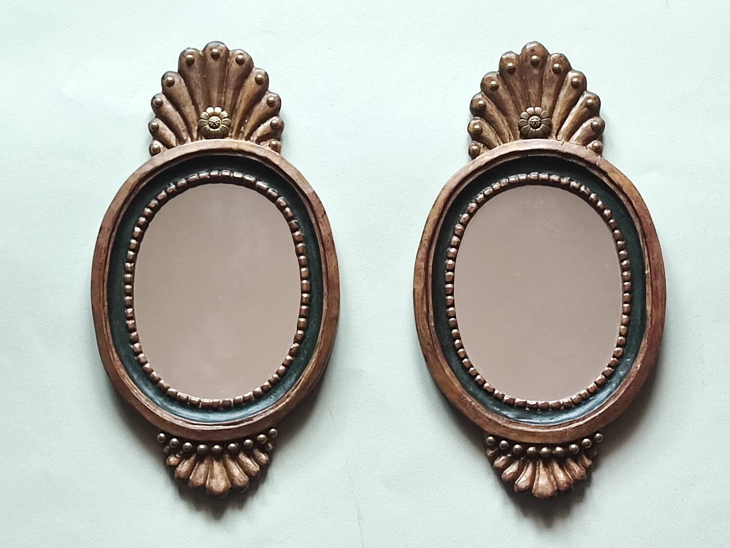 Pair small Italian mirrors