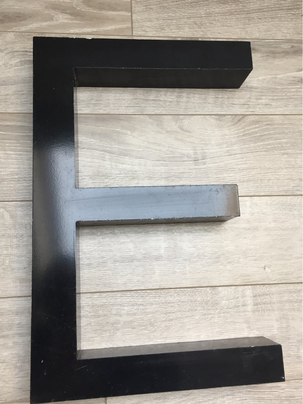 E metal letter
