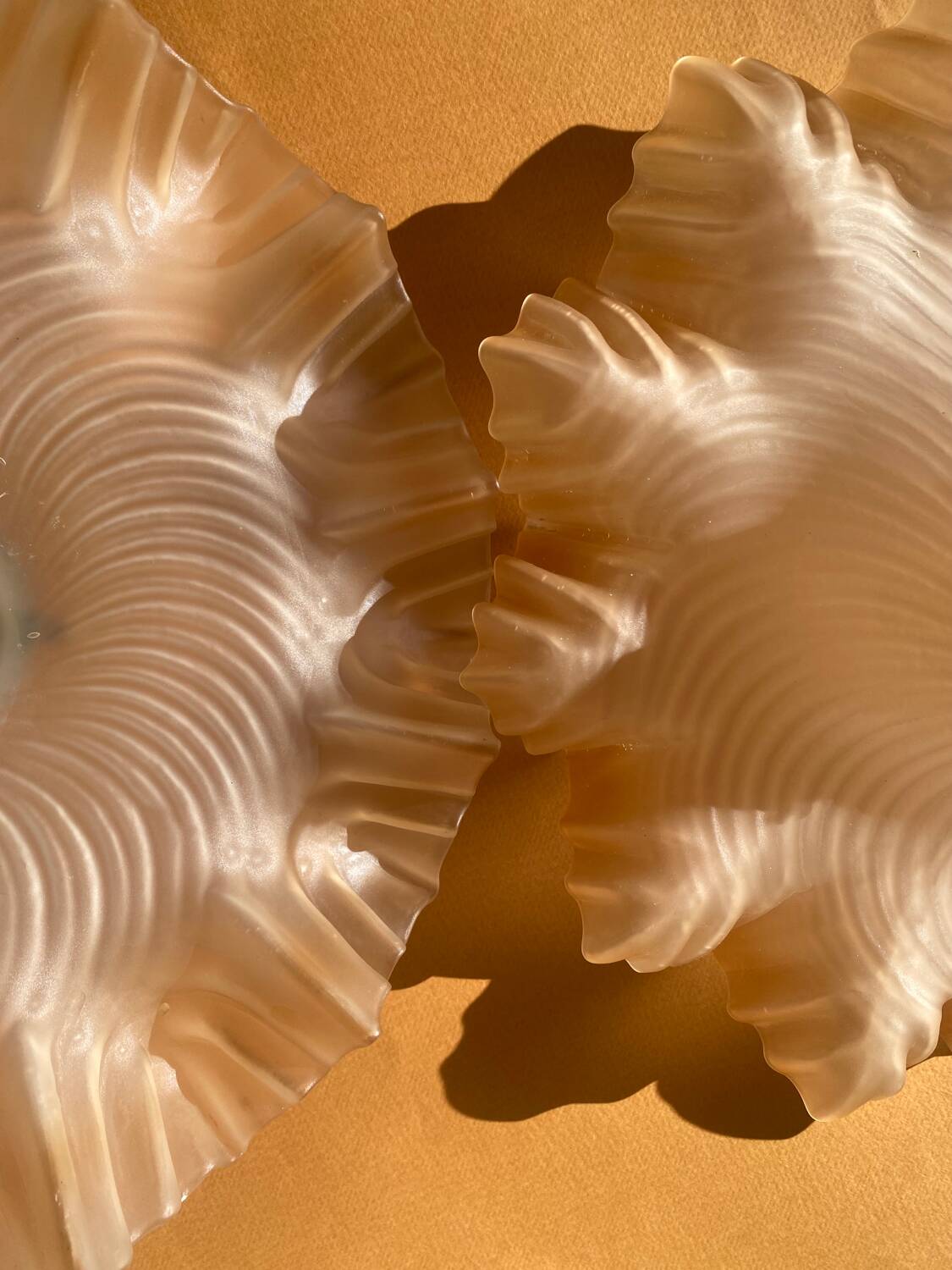 Pair of amber pendant lights