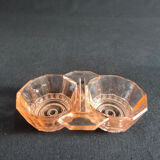 Salt shaker and pepper shaker in pink glass