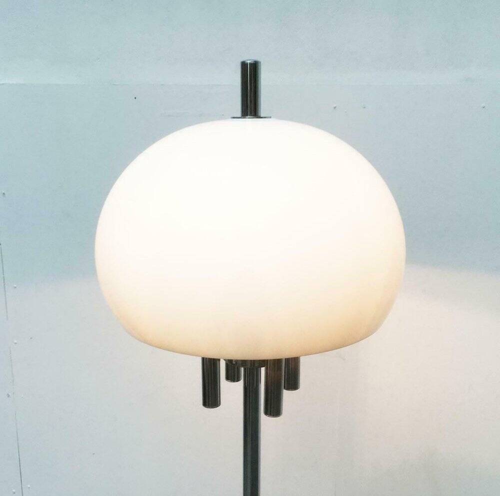 Italian space-style floor lamp from the 1960s with a stone base.