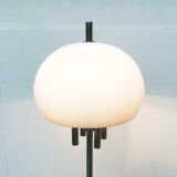 Italian space-style floor lamp from the 1960s with a stone base.