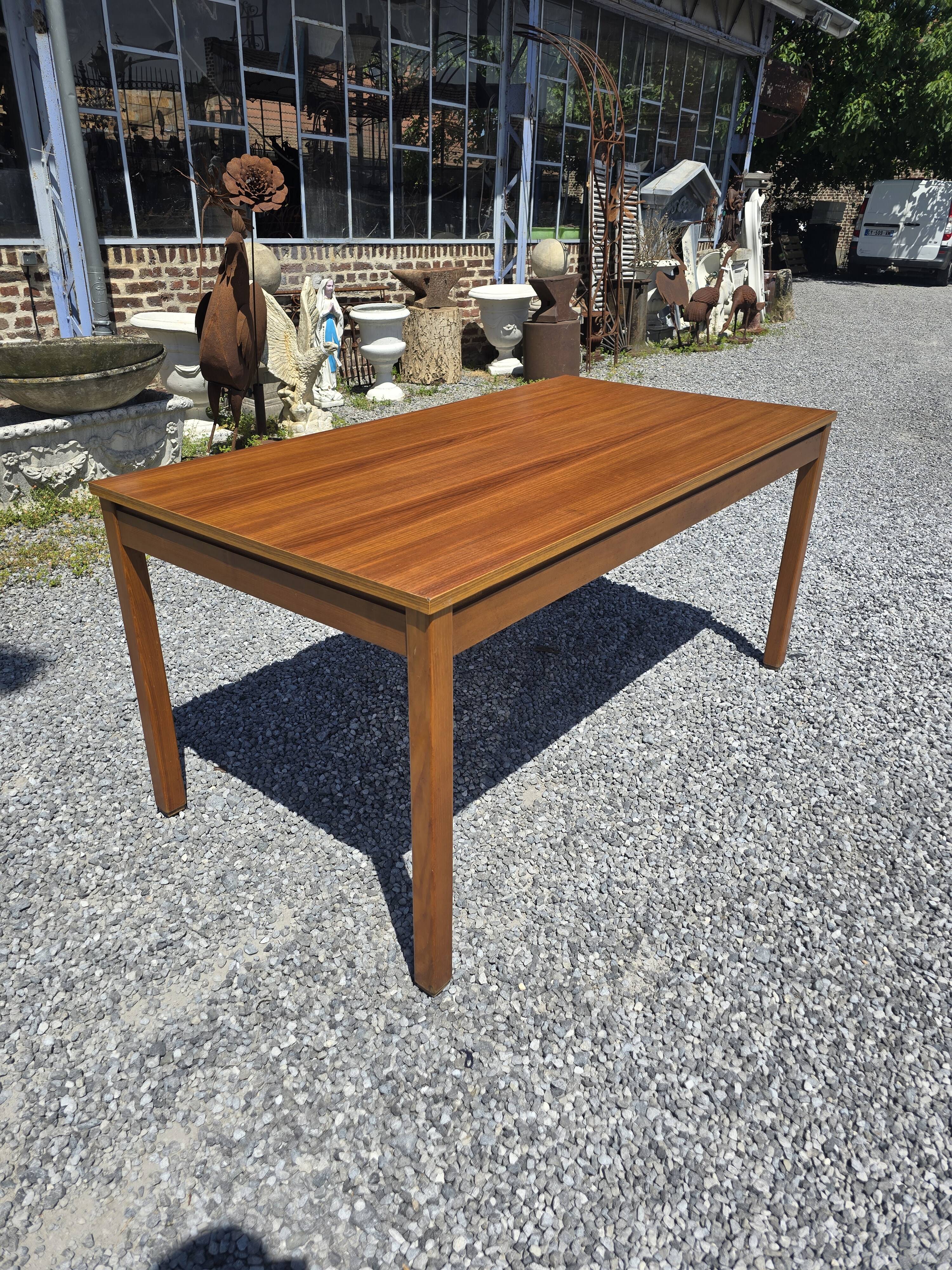 Scandinavian extendable teak table from the 60s