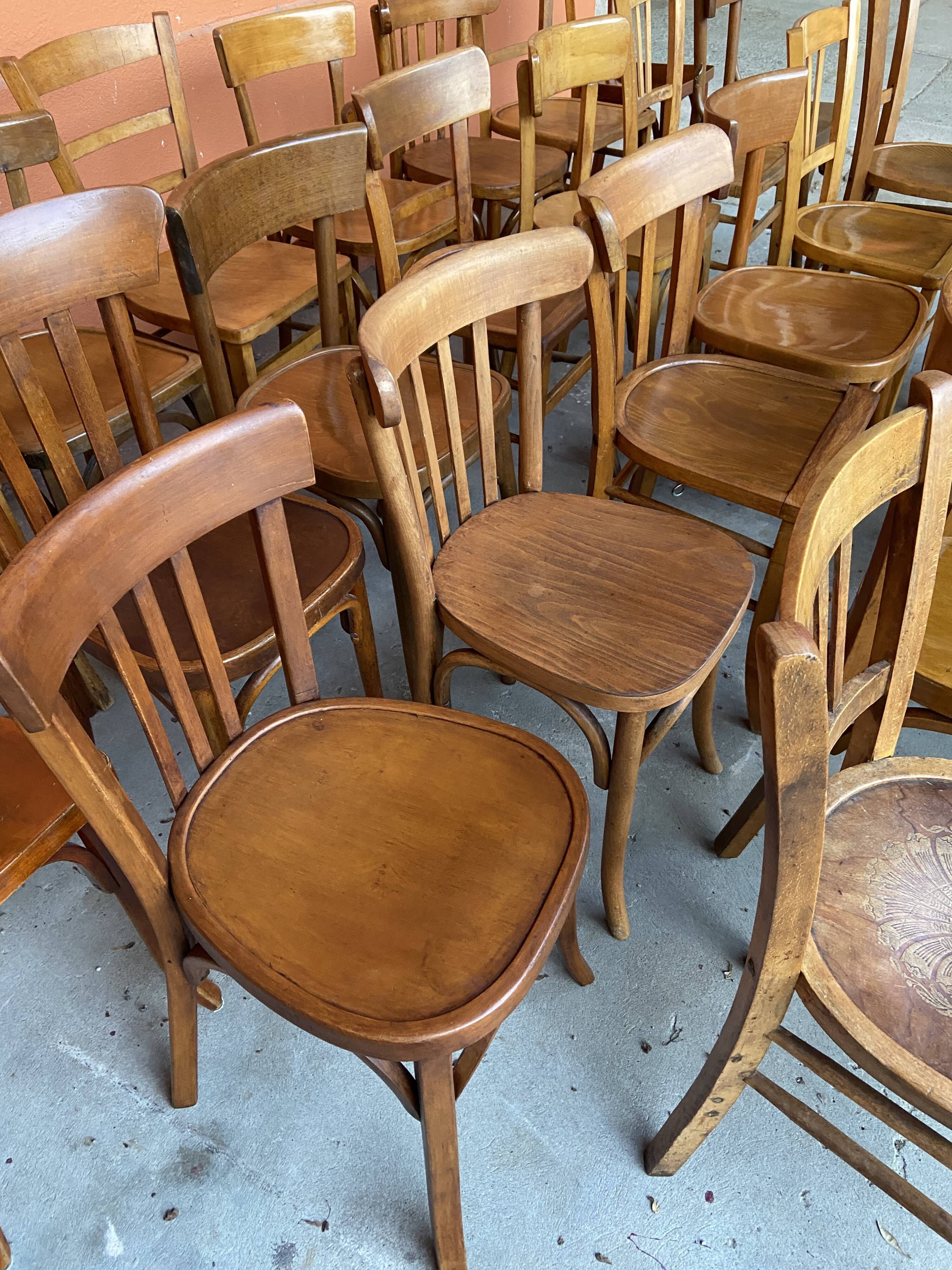 Set of 30 mismatched bistro chairs French Restaurant curved wood
