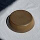 A solid brown flat-bottomed stoneware bowl D18