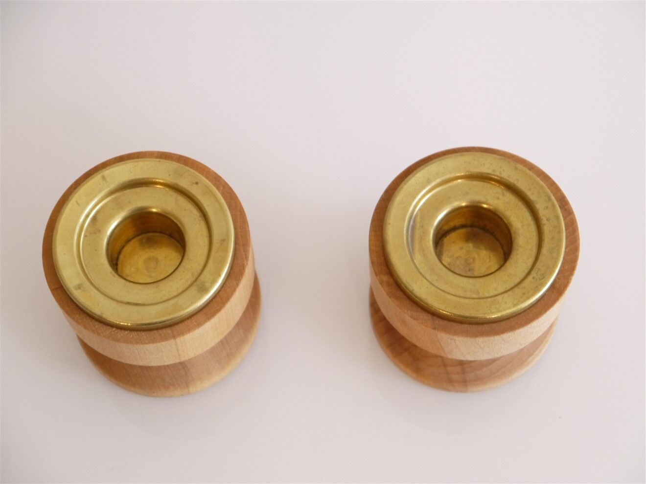 Pair of vintage candle holders in wood and brass