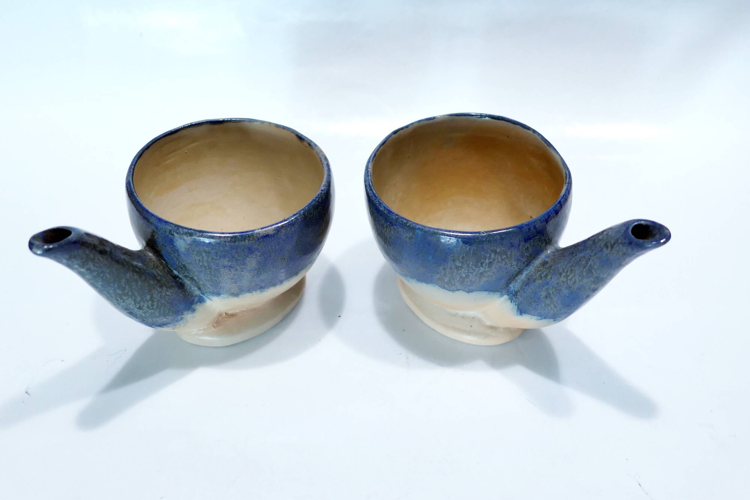 Pair of decorative ceramics in homage to René Magritte 1960-70s
