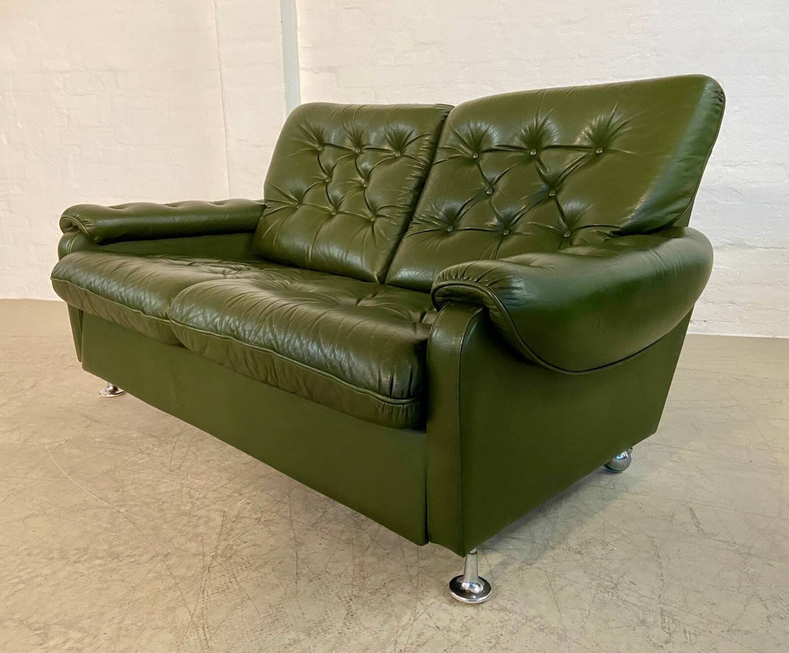 Vintage retro Danish 2 person olive green buttoned leather sofa 1970s
