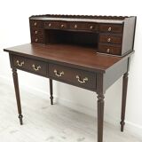 A desk with an English-style chair. After professional renovation.