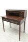 A desk with an English-style chair. After professional renovation.