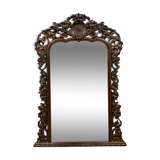 Very important Black Forest mirror in molded and carved wood