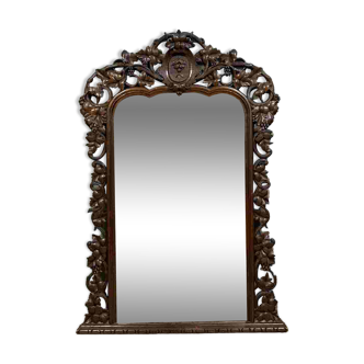 Very important Black Forest mirror in molded and carved wood