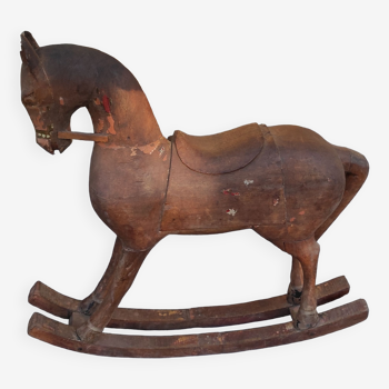 Wooden rocking horse carved late 19th early 20th
