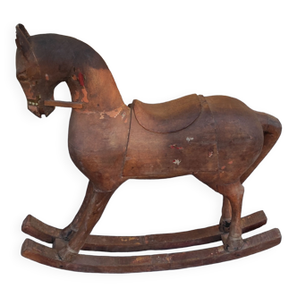 Wooden rocking horse carved late 19th early 20th