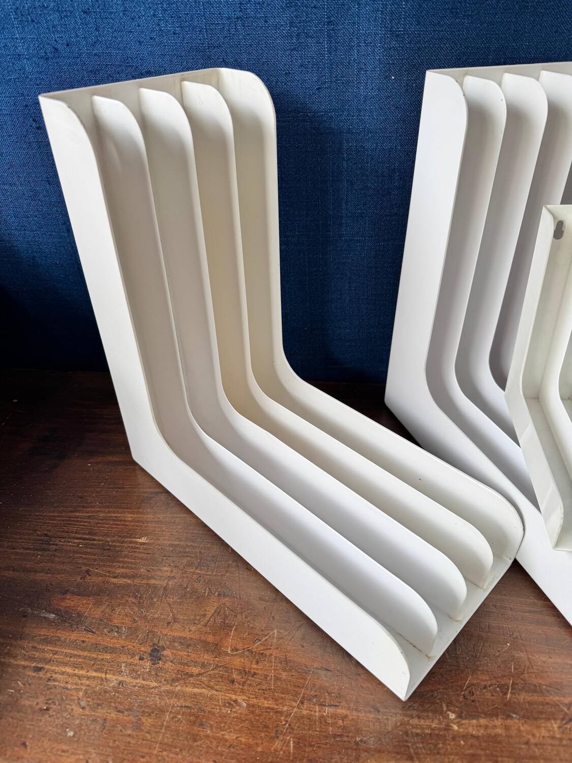 Set of 6 boomerang-shaped vinyl record racks/storage units. 1970s/80s.