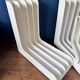 Set of 6 boomerang-shaped vinyl record racks/storage units. 1970s/80s.