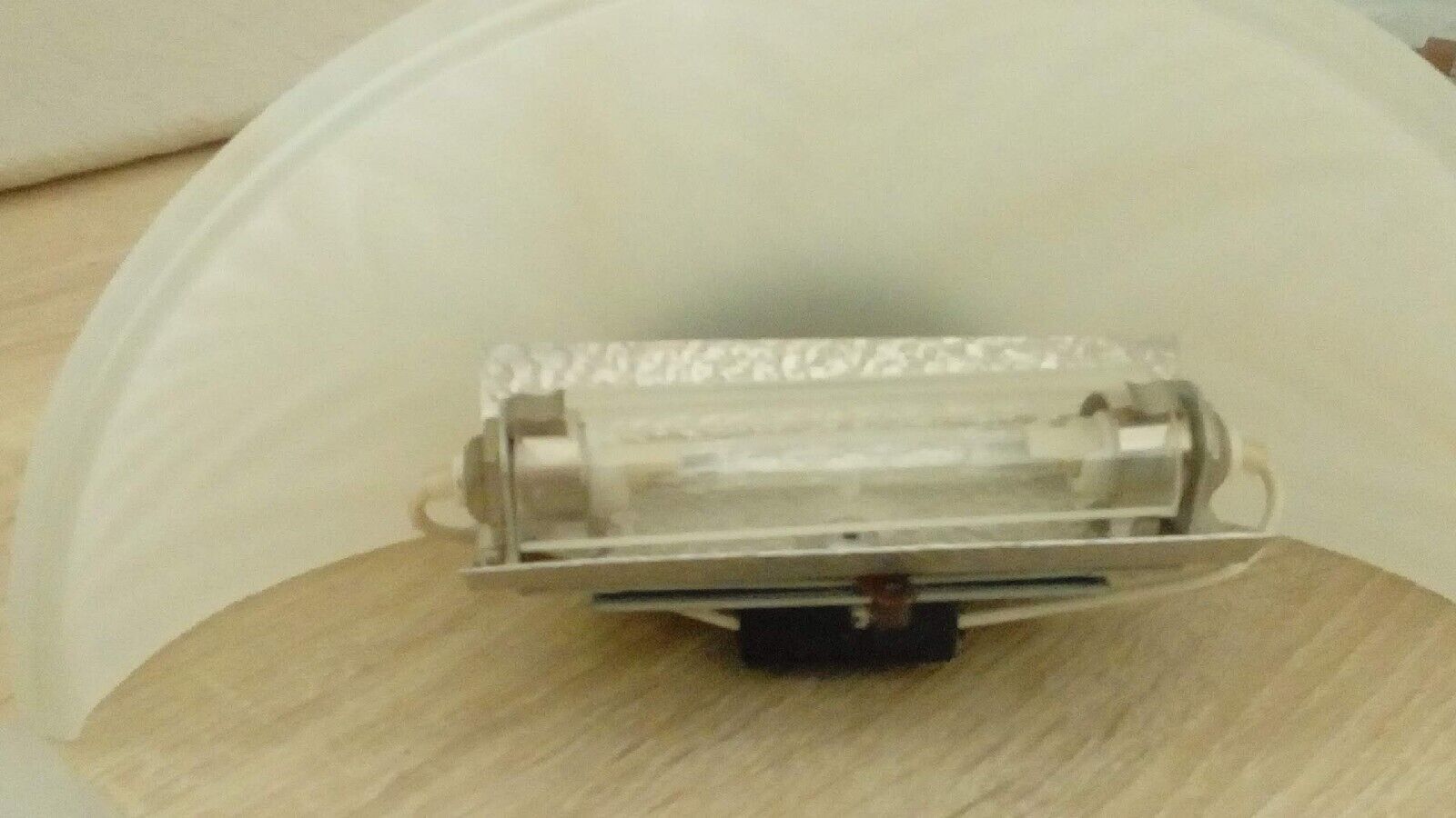 Pair of wall sconces in glass paste and brass