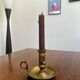 Antique push candle holder