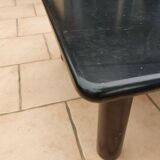 Old vintage wooden coffee table with tubular base