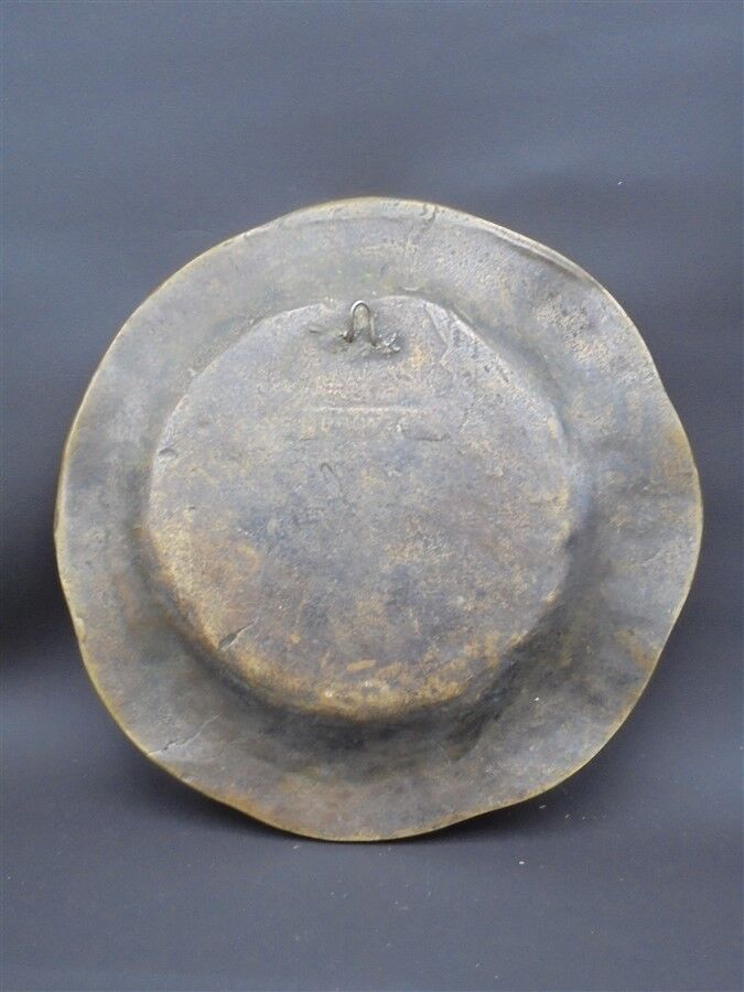 Bronze plate decorated with an eagle