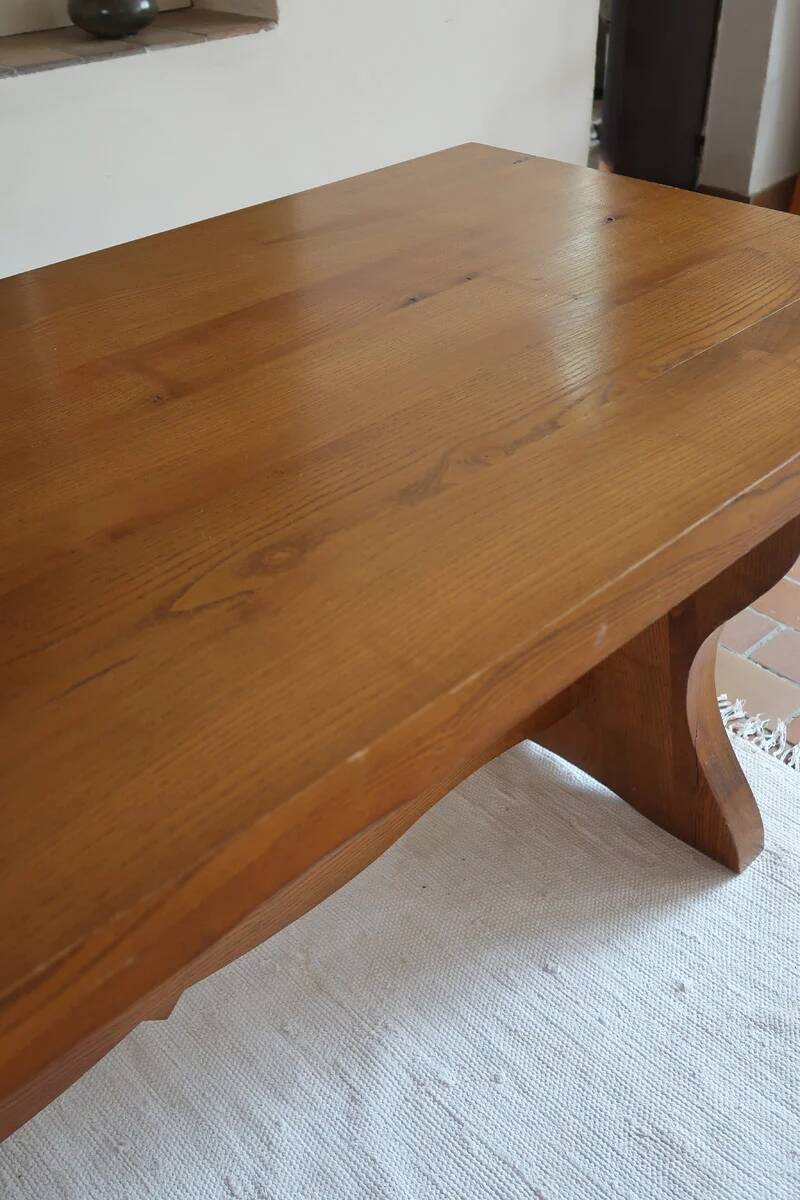 Solid wood dining table, sculpted brutalist base, 1960s.
