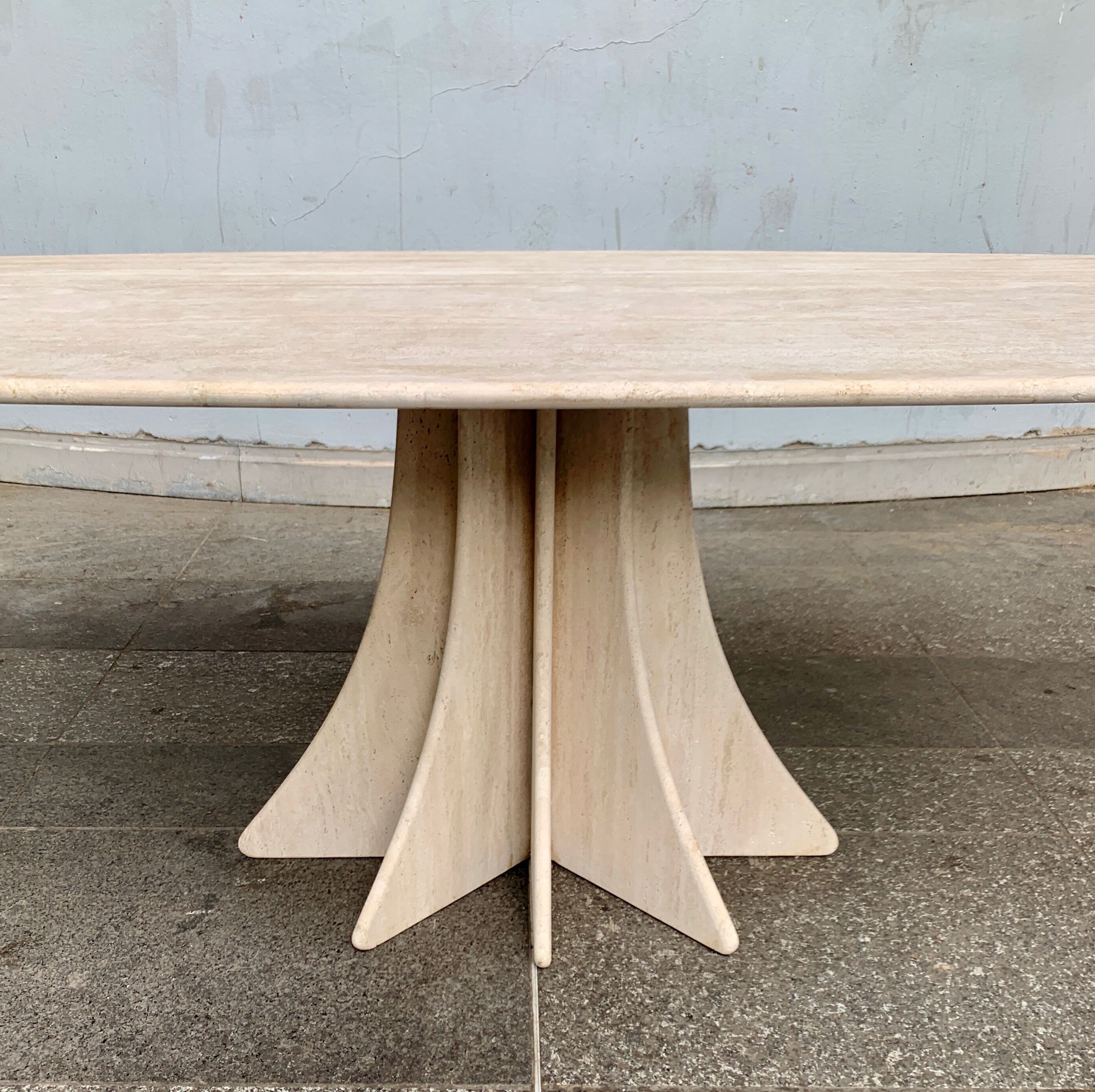 Travertine dining table by Claude Berraldacci with 8-sided stand