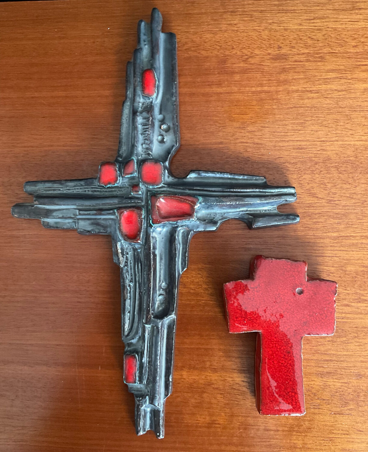 Vintage pair of glazed terracotta crosses