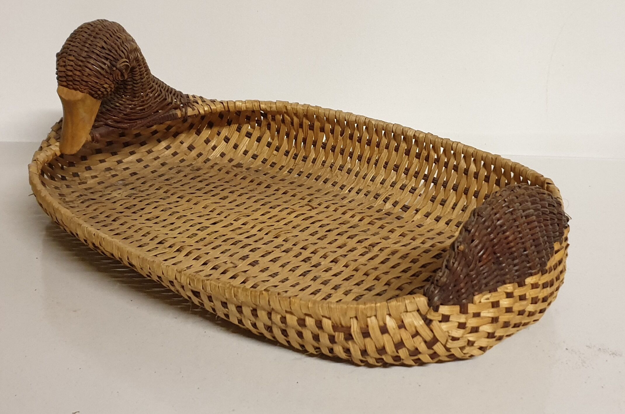 Ancient wicker duck basket