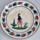 Set of 3 hollow plates and a henriot Quimper flat plate with traditional décor