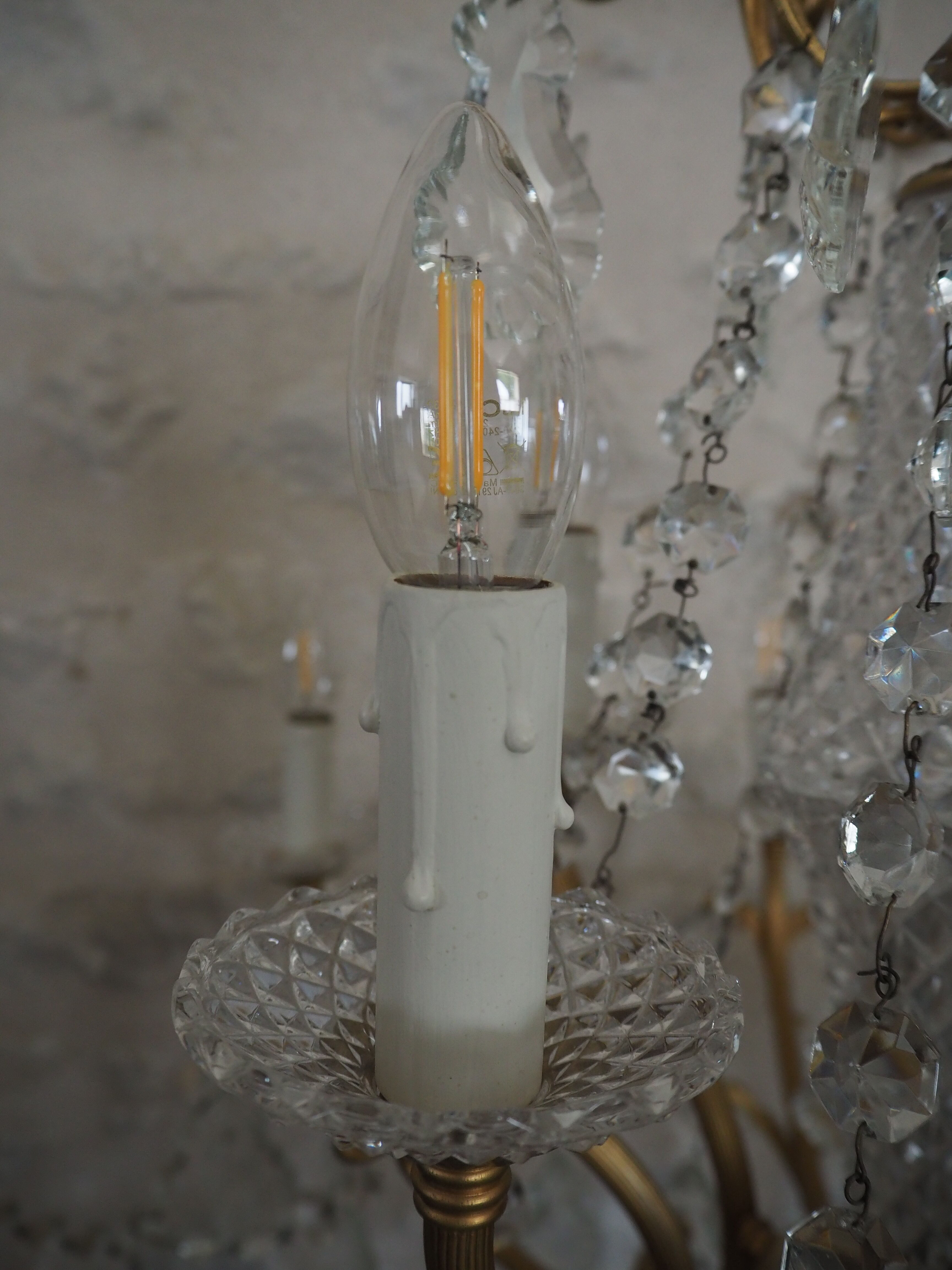 Chandelier 12 lamps with grapevines in crystal, bronze and regulated