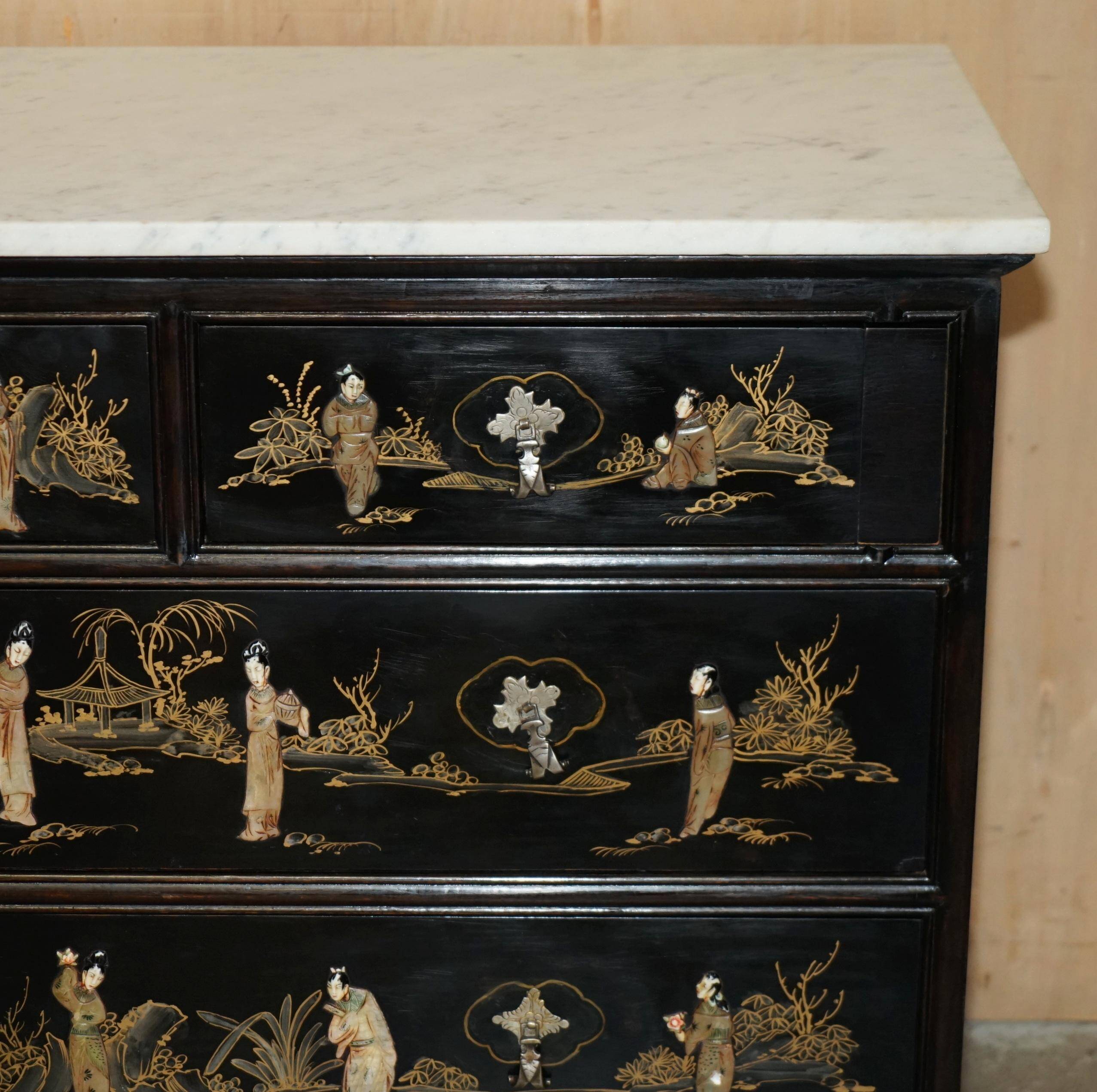 Antique Chinese commode carved in steatite with a marble top.