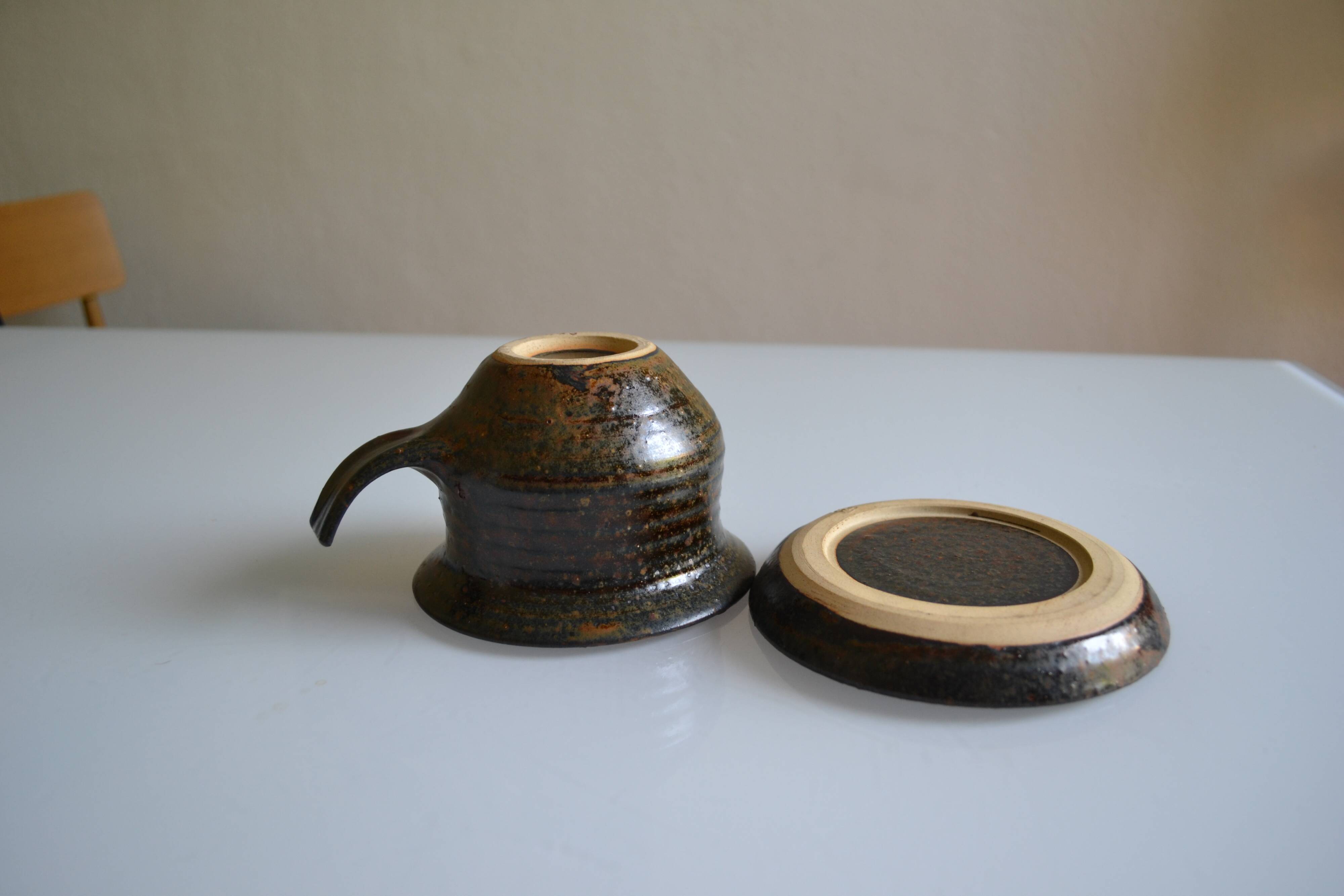 1970s ceramic cup and saucer signed