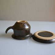 1970s ceramic cup and saucer signed