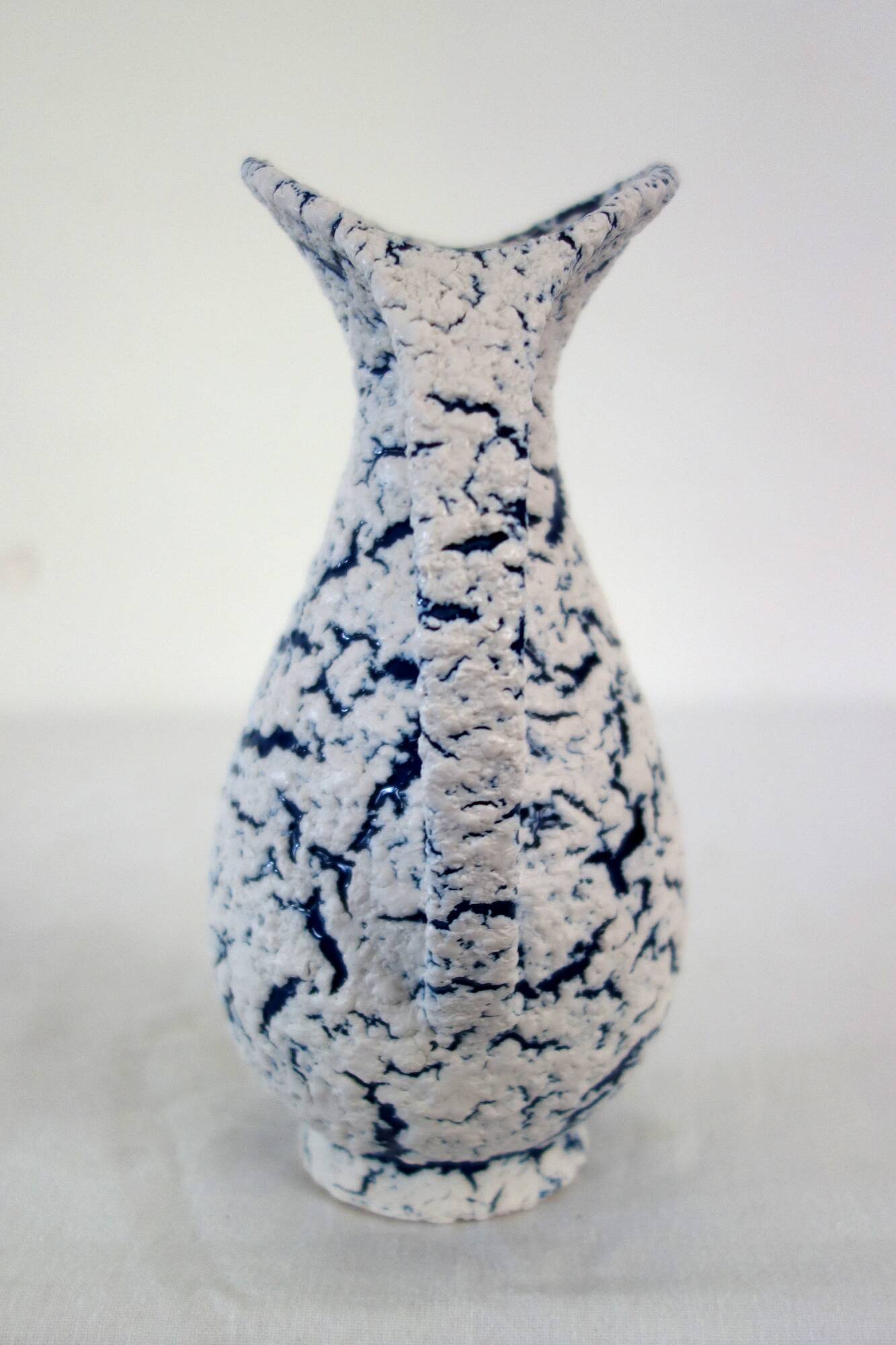 Small vintage snow stoneware vase