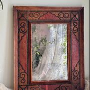 Antique mirror designed by "Pierre Lottier". Leather and nails. France 1