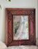 Antique mirror designed by "Pierre Lottier". Leather and nails. France 1