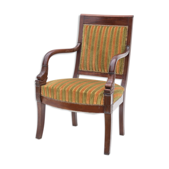 Fauteuil de style empire au dauphins