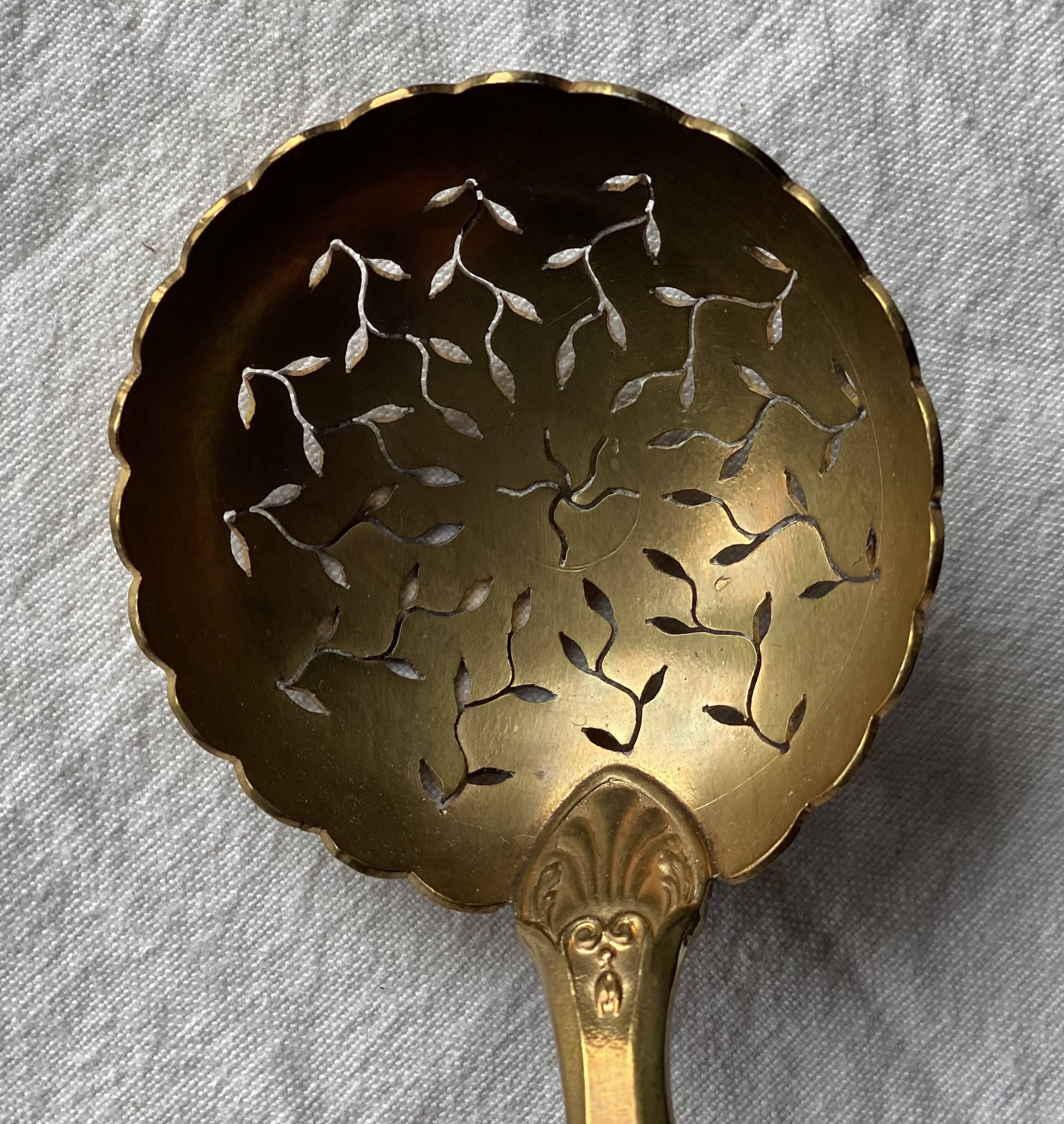 Silver sugar sifter spoon, 19th century.