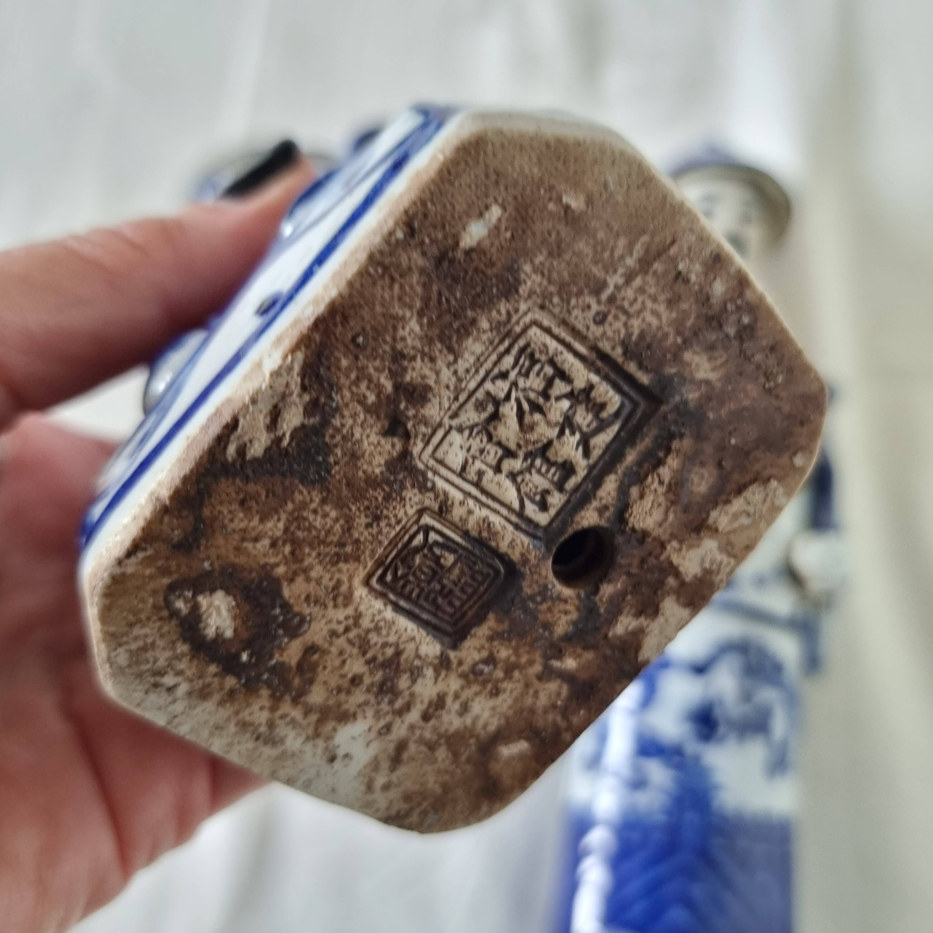 Pair of vintage Chinese blue and white porcelain figurines depicting