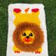 Tapis pour enfant en laine figurant un lion