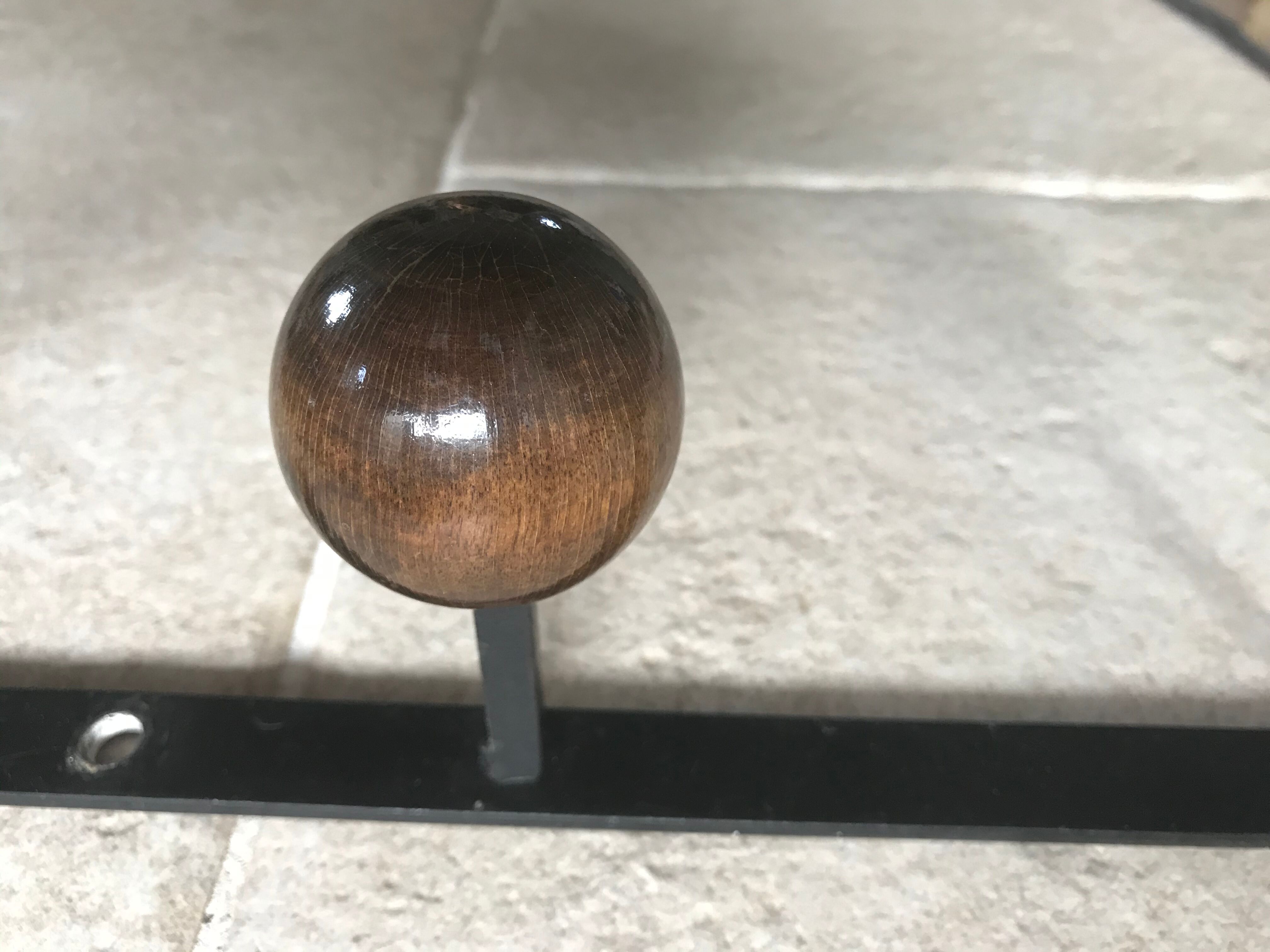 Vintage wood and metal coatrack