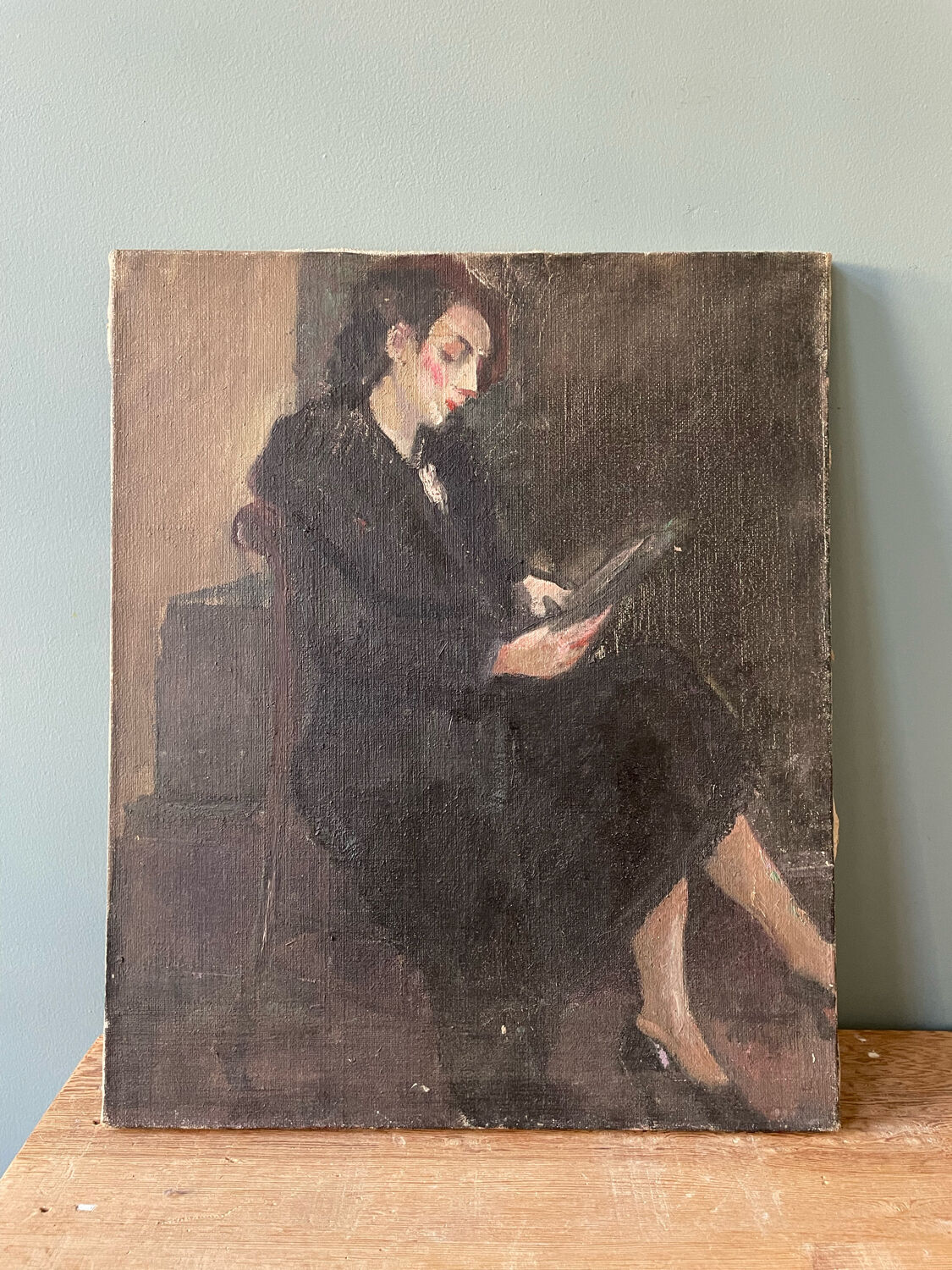 Old painting, portrait of a seated woman